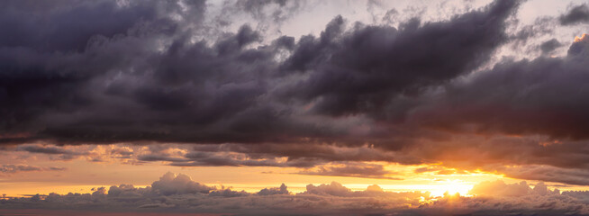 Beautiful Panoramic View of Cloudscape during a colorful sunset or sunrise. Taken on the West Coast...
