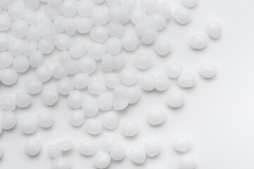 white polymer on white surface