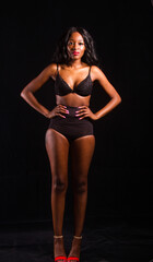Fototapeta na wymiar Beautiful Brown Skin model in black underwear