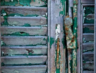 Old window shutters with latch
