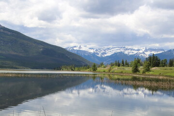 Fototapeta na wymiar Spring Reflections On Talbot Lake, Jasper National Park, Alberta