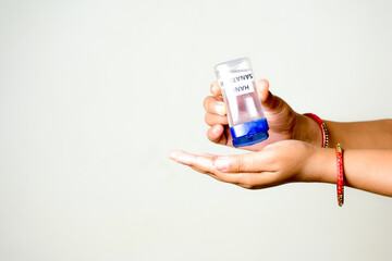 sanitize hands wiyh sanitizer for prevention  from corona virus