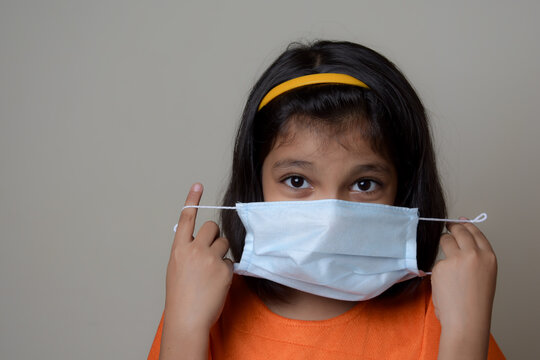 Asian Kid With Wearing  Mask Due To Covid 19 Pandemic