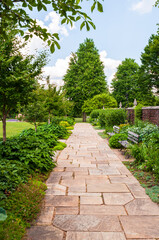 A stone walkway through the gardens at Mellon Park on a summer day, Pittsburgh, Pennsylvania, USA