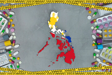 Philippines is struggling with an epidemic coronavirus pandemic. Philippines quarantine measures and coronavirus. Medicine, drugs, needles, syringes and Philippines map and flag over gray background.