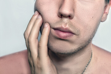 Fototapeta premium Shot of handsome attractive young caucasian male after shaving