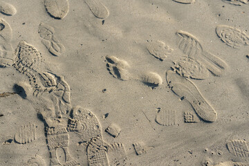 Fototapeta na wymiar Footprint Shoe On Beach; Texture or Background