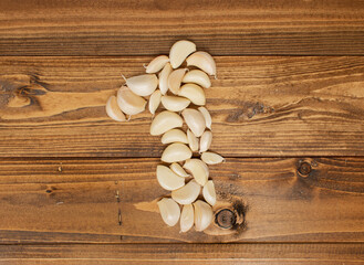 Garlics lined up and shaped like Number 1.