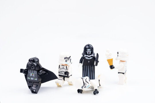 Nonthabure, Thailand - March, 23, 2018 : Lego star wars run away Lego nun ghost on vacation day isolated on white background.Nonthabure, Thailand