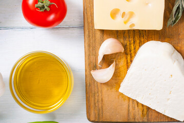 mediterranean food ingredients on white wood table