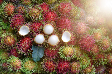 Close up Rambutan peeled. Top view Healthy fruits rambutans in a supermarket local market of ready to eat, sweet Thai fruit. Selected focus.
