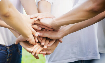 Power of male and female volunteer charity work. Stack of people hand. Team teamwork business join...