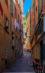 Old traditional houses in the narrow streets in the Old Town Vielle Ville in Nice in the South of France