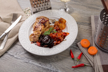 Chicken with orange and vegetables