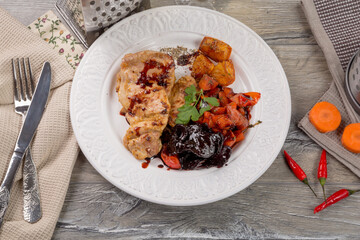 Chicken with orange and vegetables