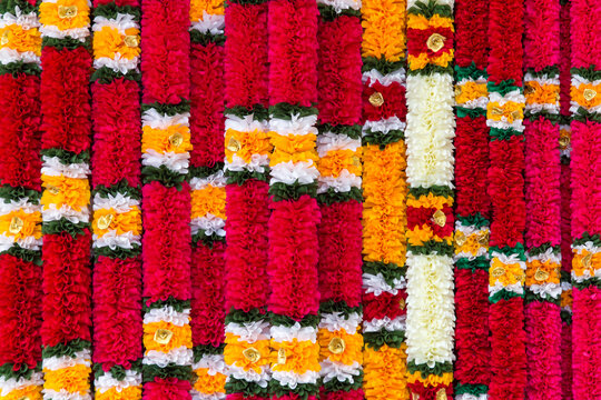 Indian traditional flower garlands used as offerings in Hindu religious ceremonies. Background