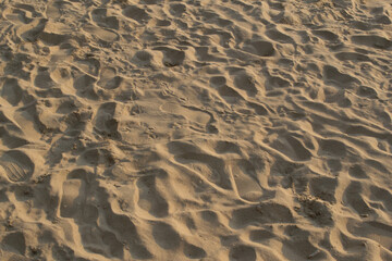 Footprints on the sand at the beach