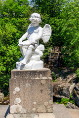Obraz premium Statue of Cupid in Sofiyivka park in Uman, Ukraine
