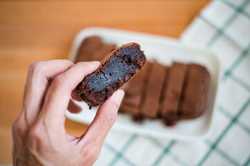 Chocolate brownie on cutting board