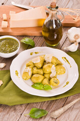 Potato gnocchi stuffed with pesto sauce.
