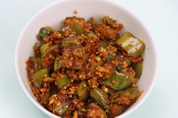Brinjal or Egg plant dry fry, south Indian curry with roasted peanut powder