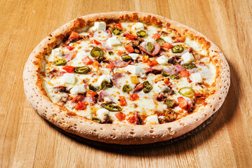 pizza on the wooden background