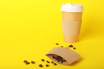 Takeaway coffee cup on color background