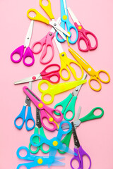 Scissors for paper on color background