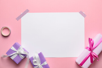 Blank card with gift boxes on color background