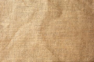 A top down view of industrial burlap surface, as a background surface.