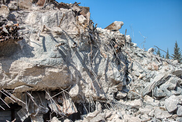 Fragments of the destroyed building. Fragments of concrete walls and foundations.