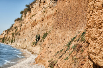 Clay mountains on sunny day