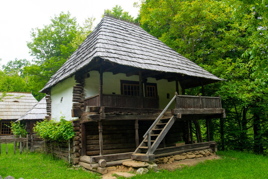 traditional house with wooden roof and tile