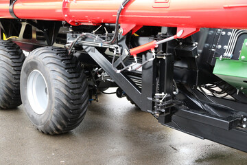 Agricultural machine. Fragment. Wheels and hydraulics.