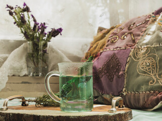 Healthy, aromatic herb black-headed tea. Turquoise colored tea.