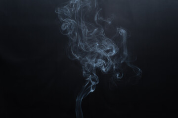 White smoke isolated on a black background. smoke image is like a ghost