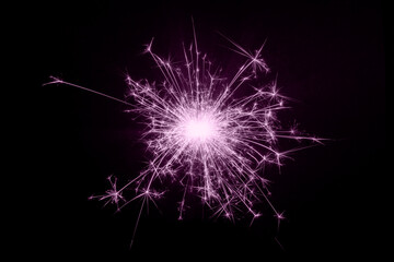 Burning sparklers isolated on black background, copy space, New Year Christmas concept
