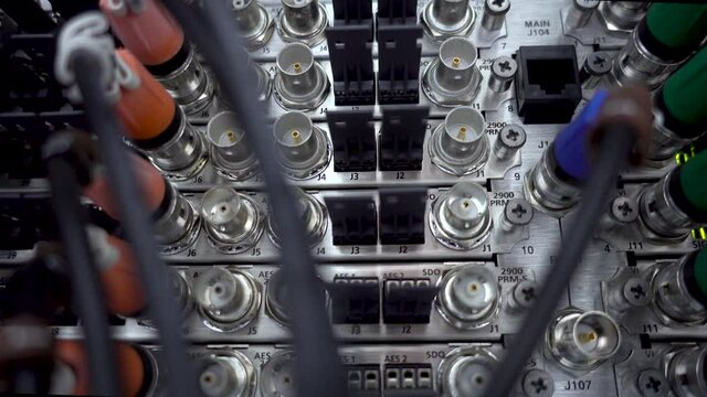 Coaxial television cables connect to TV signal receivers. Motion Camera.