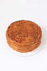 homemade honey cake on white background isolated