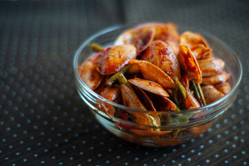 Spicy Paphia textile, or known as retak seribu lala fried with chillies. Served in a bowl. selective focus.