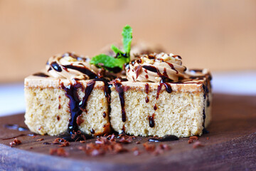 Coffee cake topping chocolate delicious sweet dessert served on the table /