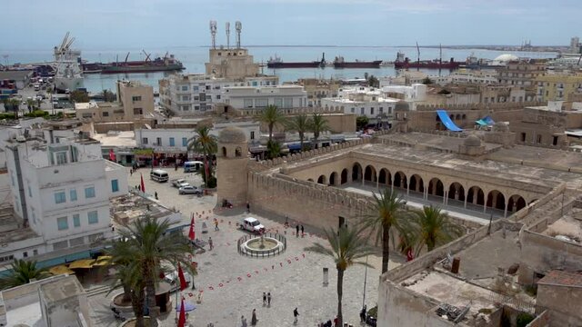 Aerial view video of Tunisian cityscape of  streets of Sousse city in Tunisia country. Different old and modern architecture. marine port, ancient  mosque Great Mosque.