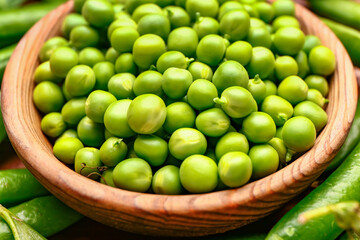 Plate with tasty fresh peas on table, closeup