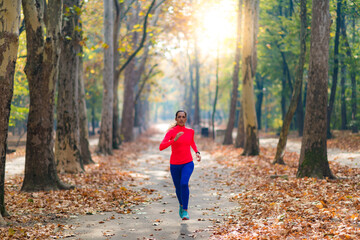 Woman Jogging Outdoors in Park