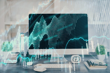 Forex graph hologram on table with computer background. Double exposure. Concept of financial markets.
