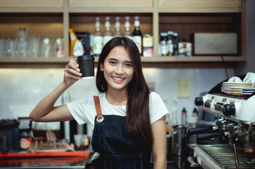 Fototapeta na wymiar New generation women do small business in coffee shop counter