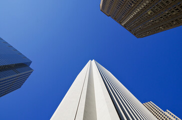 Modern skyscraper and highrise architecture in downtown Chicago in Illinois towering above street...