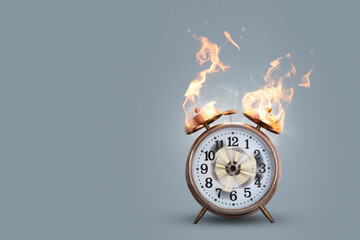 Alarm clock on fire with actual flame