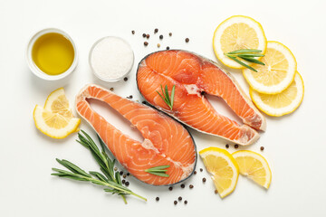 Composition with salmon meat and spices on white background, top view