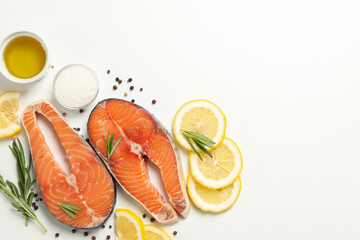 Composition with salmon meat and spices on white background, top view